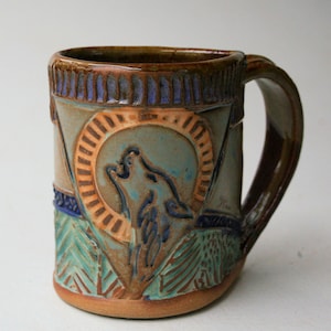 Handmade Wolf Pottery Mug: Artisan Stoneware Coffee Cup