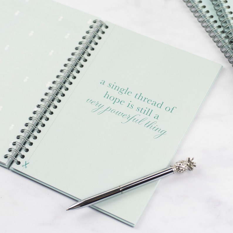 A cut out quote page with the words 'a single thread of hope is still a very powerful thing'.