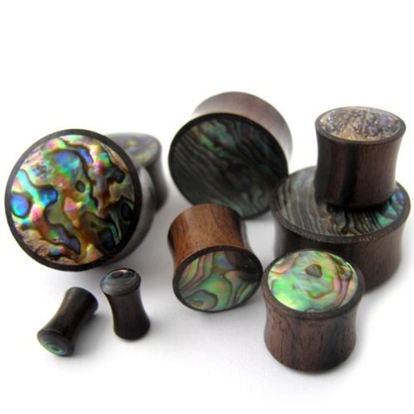 Tapones de madera con incrustaciones de concha de abulón