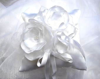 white wedding ring cushion with romantic handmade flowers in satin and organza