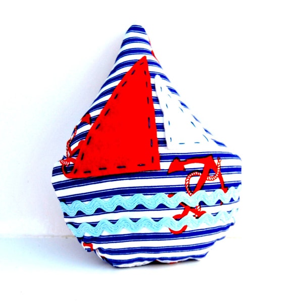 Sailing boat handmade pincushion in cotton fabric with blue and white stripes and red anchors