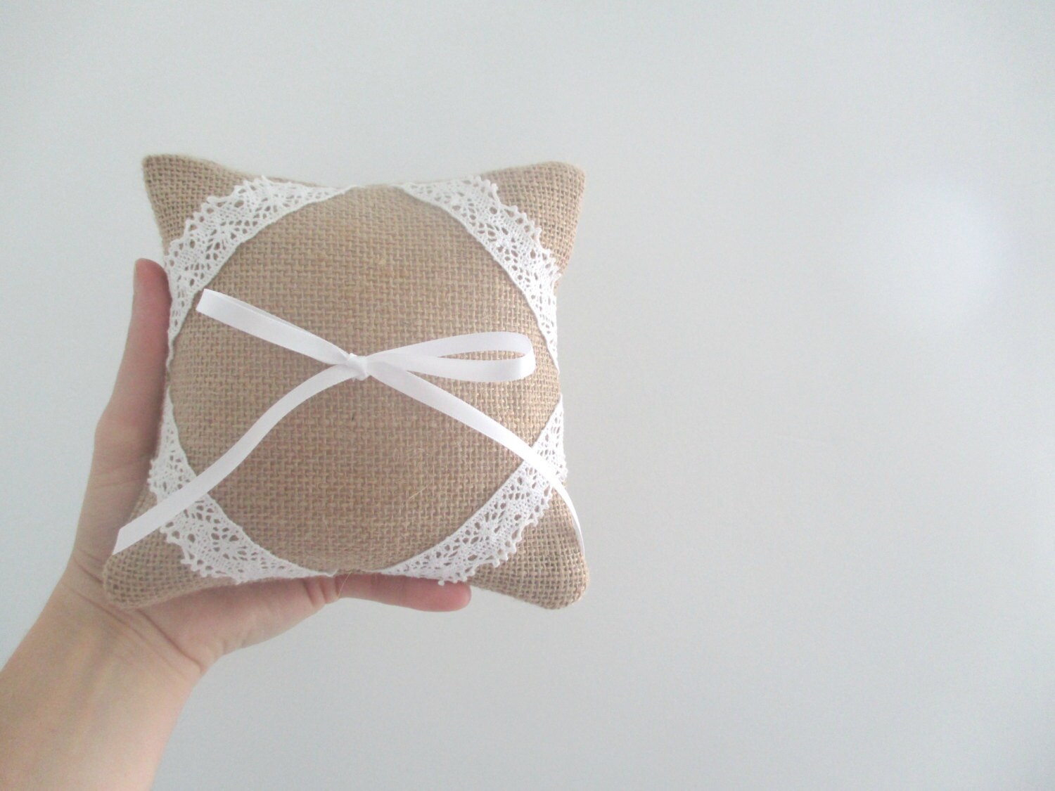 Handmade rustic chic wedding ring cushion in burlap with