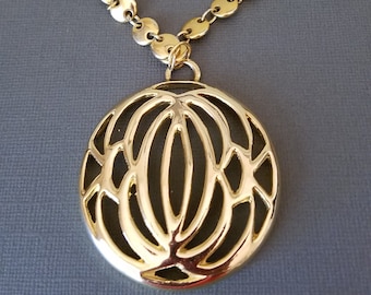 Gold Plated Medallion paired with a vintage Trifari Chain
