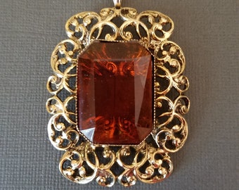 Faceted Amber Glass Pendant in unmarked Gold Filligree Frame