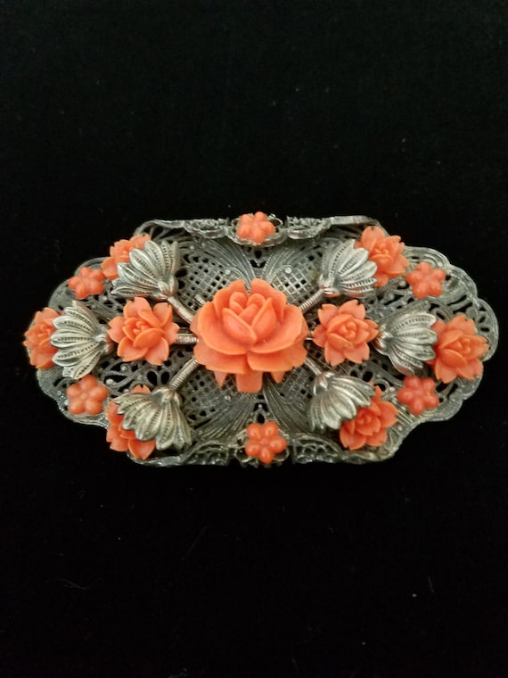 Coral Celluloid Brooch
