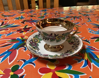 Vintage bone china teacup and saucer with floral designs- Rosina China, England