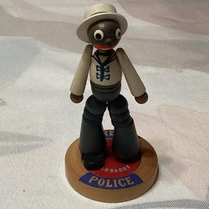 Vintage wooden beaded folk art Harbour Police movable figurine- souvenir of Barbados