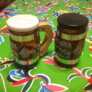 Vintage pair of Aloha Hawaii souvenir amber glass beer mug salt and pepper shakers with wooden handles