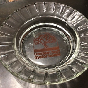 Vintage Western Host Motor Hotels advertising glass ashtray