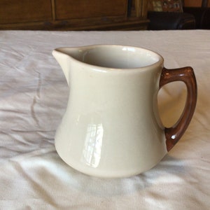 Vintage beige Shenango Inca Ware restaurant ware large creamer or small pitcher with brown handle- USA