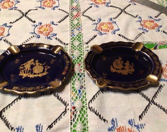 Vintage pair of mirror image Limoges Veritable Porcelaine D’Art cobalt blue 22k gold rococo romantic couple oval ashtrays- France