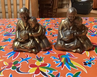 Vintage pair of hand cast brass father and son looking at globe by Victor bookends- PM Craftsman, Florida