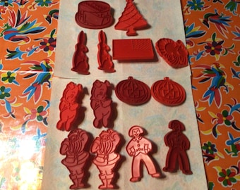 Vintage set of 21 assorted red Tupperware plastic  cookie cutters- USA- sold separately