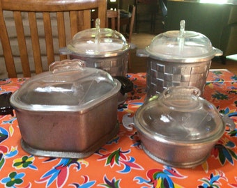Vintage hammered aluminum Guardian Service assorted lidded pots and pans, and ice buckets- sold separatel