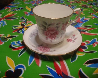 Vintage  bone china teacup and saucer with pink rose designs- Springfield, England