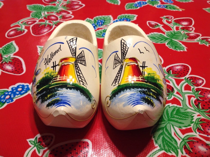 Vintage white Dutch wooden shoes with hand painted windmill designs