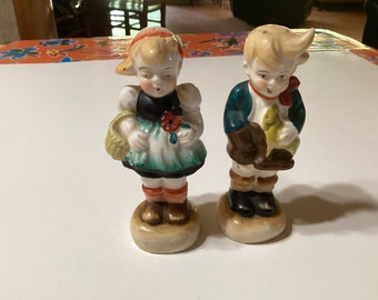 Vintage pair of hand painted ceramic Bavarian or Alpine boy and girl salt and pepper shakes- Japan