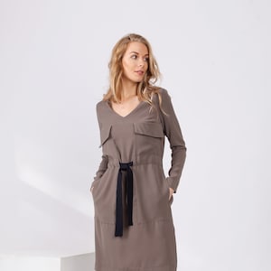 Cocoa brown long sleeve dress for women, elegant V-neck knee length dress with black belt and side pockets made of polyester