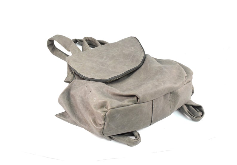 Light gray zipped leather backpack