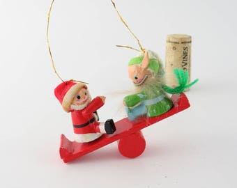 Vintage Kurt S Adler Christmas Ornament: Santa & Elf See Saw