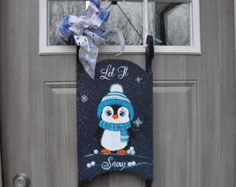 Heavy wooden sled door hanger