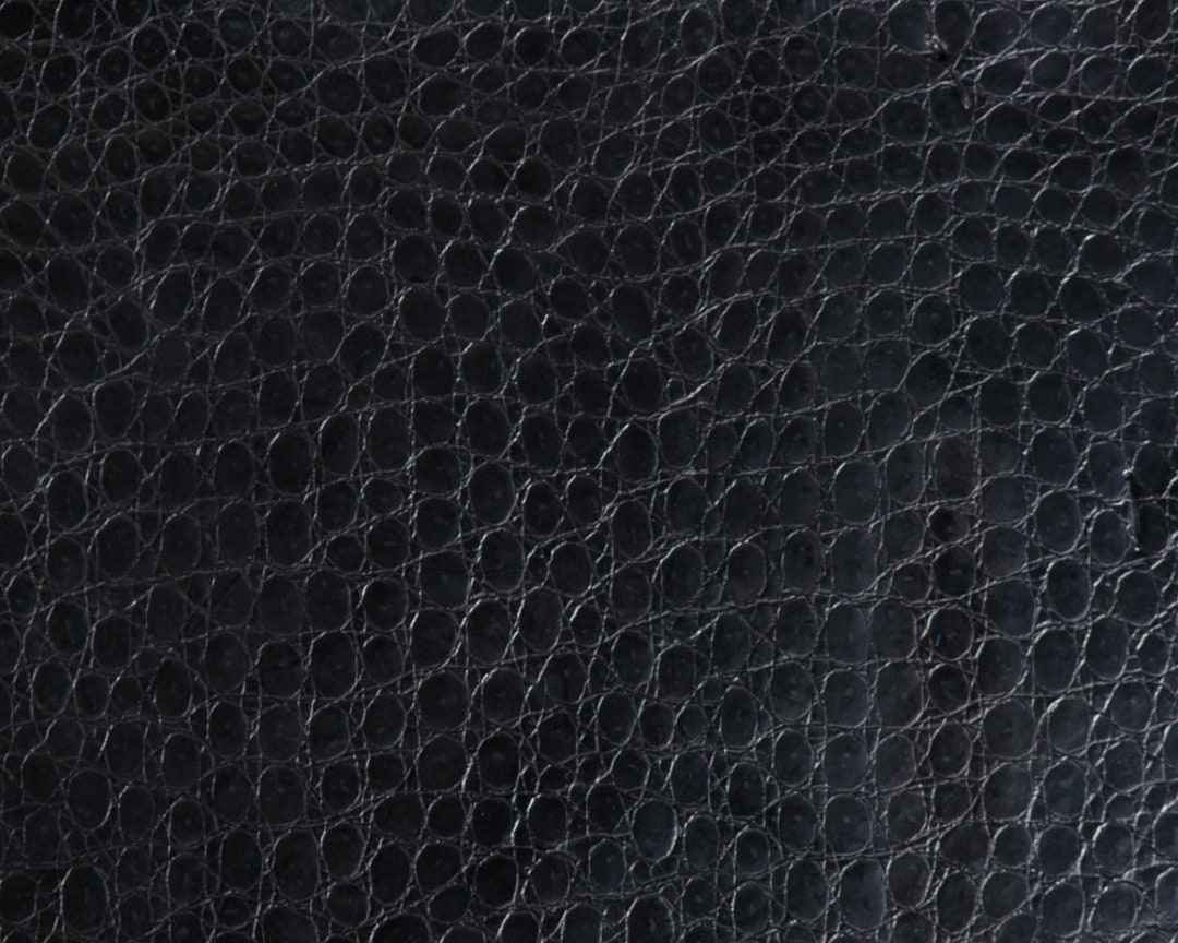 Premium Photo  Black crocodile leather texture with for background.