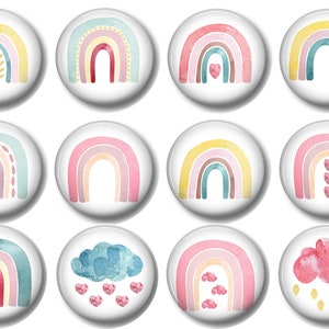 May include: Twelve watercolor rainbow buttons with various designs. Some rainbows have hearts, others have dots, and some have clouds. The buttons are all white with a glossy finish.