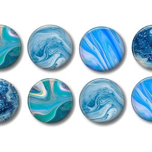 May include: Eight round blue and white abstract art designs with swirling patterns and bubbles. The designs are on a white background.