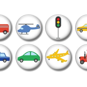 May include: Set of eight white button pins featuring colorful illustrations of vehicles. Includes a red fire truck, blue helicopter, traffic light, yellow taxi, blue police car, green car, yellow airplane, and red tractor.