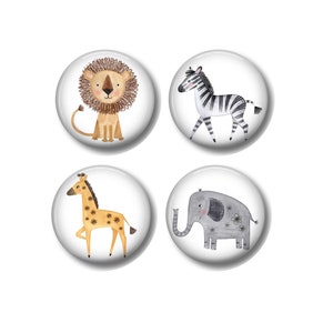 May include: Four round buttons with different animal illustrations. The buttons feature a lion, zebra, giraffe, and elephant. The animals are drawn in a cartoon style with bright colors.