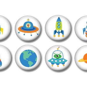 May include: Eight colorful space-themed buttons with images of rockets, spaceships, planets, and aliens. The buttons are white with a glossy finish.