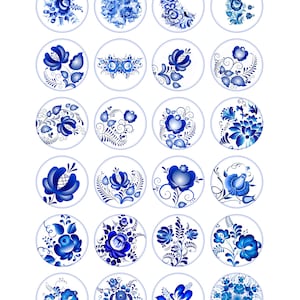 May include: A set of 18 blue and white ceramic tiles with floral designs. The tiles are round and have a white background with blue floral patterns.