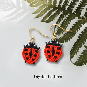 May include: A pair of beaded ladybug earrings featuring red and black glass beads with gold-tone metal ear wires. The ladybug design is crafted with a grid-like pattern of small beads. The text Digital Pattern is printed below the earrings.