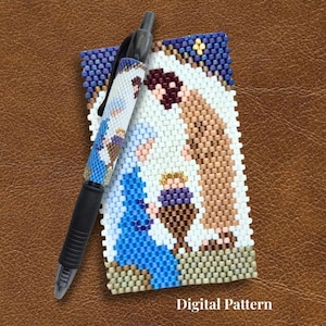 May include: A pen and a rectangular piece of beadwork featuring a nativity scene. The beadwork uses white, blue, brown, and gold beads to depict figures. The pen is wrapped in a matching beaded sleeve. The text Digital Pattern is visible.