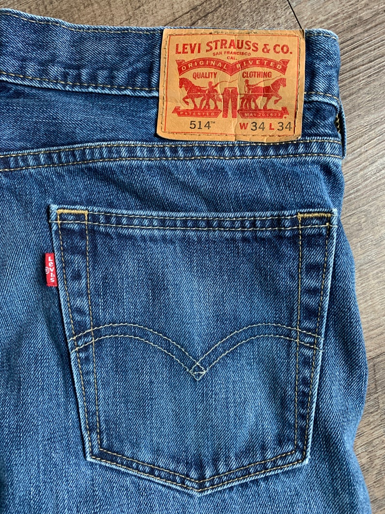 Vintage LEVIS 514 W34 L34 Distressed Denim Jeans image 1