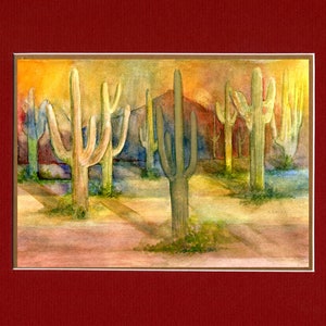 May include: Watercolor painting of a desert landscape with tall, green cacti in the foreground and a red-orange sunset in the background.