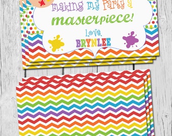 May include: A thank you card with a colorful chevron pattern and a paint palette design. The text reads "Thanks for making my party a masterpiece! Love, BRYNLEE".