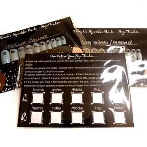 May include: Two black cards with white text and white squares. The cards are labelled "Sarah's Sparkles Nails - Size Finder" and have different nail shapes: "Medium Square" and "Long Stiletto/Almond". The cards include instructions on how to use the size finder.
