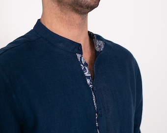 Blue linen shirt with a patterned collar.