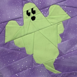 May include: A green ghost with black eyes and a mouth is flying against a purple background with white stars.