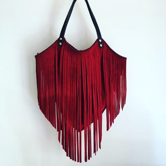 red suede handbag