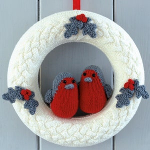 Stylish white vintage Christmas holiday wreath knitting pattern holly with robins