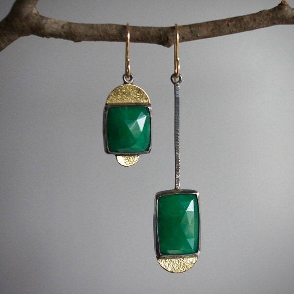 Emerald green beryl mismatched earrings with 18K gold accents..........Love Green.