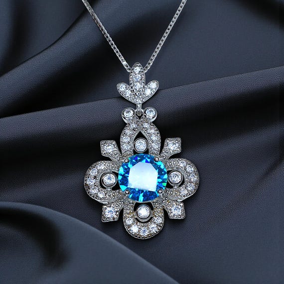 Blue Topaz Necklace - Sterling Silver 4 Petal Flower Jewelry -  November Birthstone adjustable Chain Blue Gemstone Necklace  1126