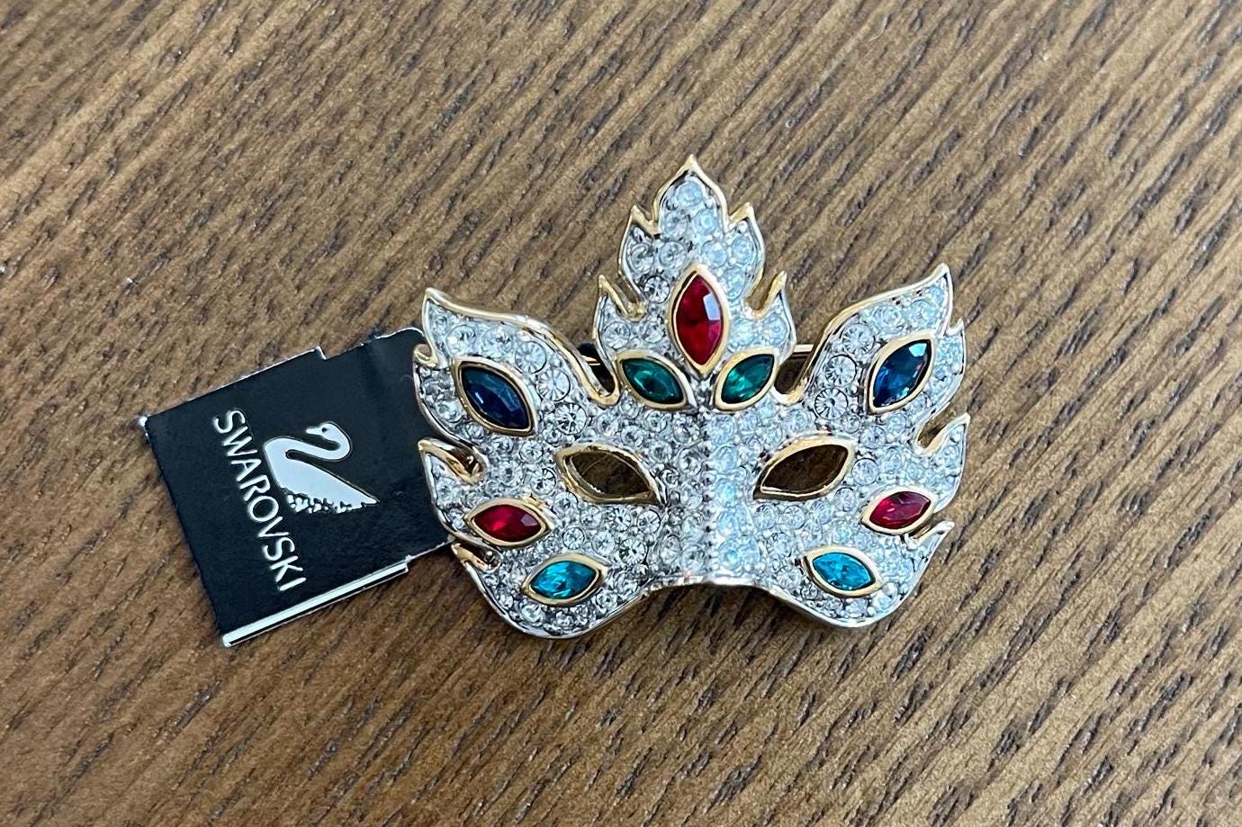 Swarovski Retired Crystal Multicolored Signed Brooch Pin Mardi Gras Mask with Tag/Box