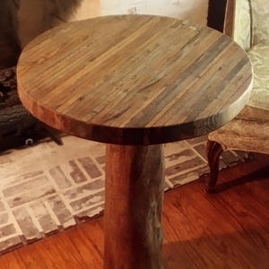 Craftsman built table made from reclaimed pallet wood w/ log base, 2 in thick top, brown finish