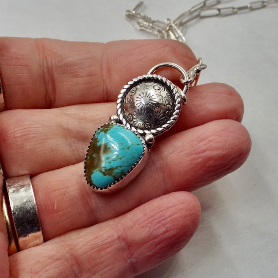 Kingman Turquoise Set in a Serrated Bezel, Western Style Patterned Dome with Twisted Rope Detail, Sterling Paperclip Chain