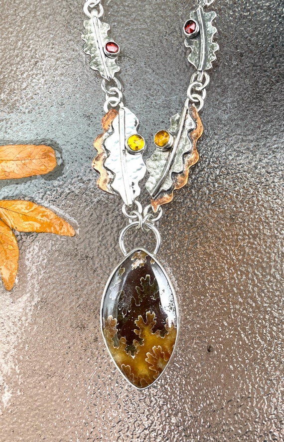 Sutured Ammonite Fossil Necklace with Baltic Amber, Garnets, Sterling Silver and Copper