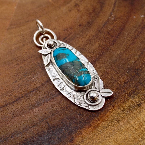 Turquoise Oval Pendant With Flower Accents, Sterling Silver Necklace