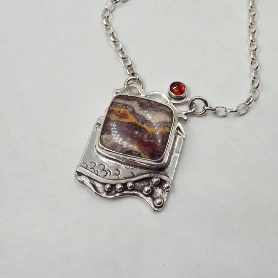Striped Utah Opal with a Rosecut Garnet Accent Stone Pendant